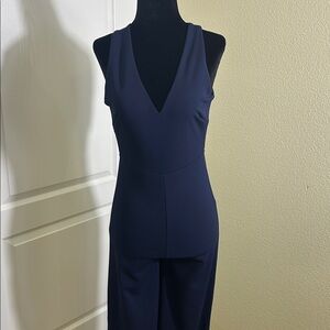 Joe & Elle Midnight Blue Jumpsuit. Criss cross back. Classy. Size small.